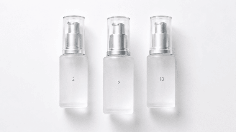 Three niacinamide serum bottles showing 2%, 5% and 10% concentration with 5% emphasised — what concentration of niacinamide actually works for mature skin